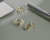 Lucia - Pear Bezel Earrings Lifestyle Image