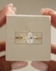 18k Yellow Gold / Platinum | 10x7mm Pear Moissanite | Lab Diamond side stones
