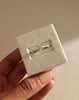 Platinum | 7mm Round Moissanite | Lab Diamond side stones