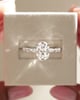 Platinum | 10x7mm Oval Moissanite | Lab Diamond side stones