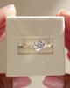 18k Yellow Gold / Platinum | 7mm Round Moissanite | Lab Diamond side stones