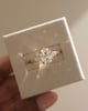 18k Yellow Gold | 10x7mm Oval Moissanite | Lab Diamond side stones