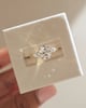 18k Yellow Gold | 9x6.5mm Oval Moissanite | Lab Diamond side stones