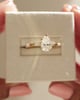18k Yellow Gold | 9x6mm Pear Moissanite | Lab Diamond side stones