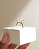18k Yellow Gold | 11x8mm Oval Moissanite | Lab Diamond side stones