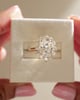 18k Yellow Gold | 11x8mm Oval Moissanite | Lab Diamond side stones