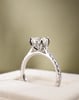 Platinum | 7.5mm Round Moissanite | Lab Diamond side stones