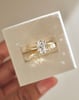 18k Yellow Gold | 9x6.5mm Oval Moissanite | Lab Diamond side stones