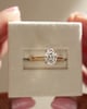 18k Yellow Gold / Platinum | 8x6mm Oval Moissanite | Lab Diamond side stones