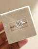Platinum | 8.5mm Round Moissanite | Lab Diamond side stones