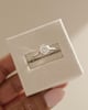 Platinum | 7mm Round Moissanite | Lab Diamond side stones