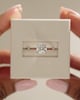 Platinum | 7mm Round Moissanite | Lab Diamond side stones