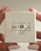 Platinum | 9x7mm Emerald Moissanite | Moissanite side stones