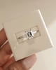 Platinum | 9x7mm Emerald Moissanite | Moissanite side stones