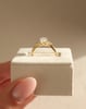 18k Yellow Gold | 10x7mm Pear Moissanite | Lab Diamond side stones
