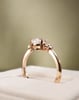 18k Rose Gold | 9x6mm Pear Moissanite | Lab Diamond side stones