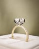 18k Yellow Gold / Platinum | 9x7.5mm Elongated Cushion Moissanite | Lab Diamond side stones
