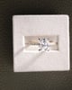 18k Yellow Gold / Platinum | 9x7.5mm Elongated Cushion Moissanite | Lab Diamond side stones