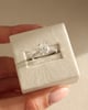 Platinum | 10x7mm Oval Moissanite | Lab Diamond side stones