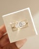 18k Yellow Gold | 9x7mm Oval Moissanite | Moissanite side stones