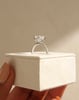 Platinum | 8.5x6.5mm Emerald Moissanite | Lab Diamond side stones
