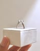 Platinum | 8.5mm Round Moissanite | Lab Diamond side stones