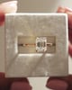 18k Yellow Gold | 8.5x6.5mm Emerald Moissanite | Lab Diamond side stones