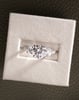 Platinum | 8.5mm Round Moissanite | Moissanite side stones