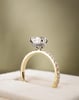 18k Yellow Gold / Platinum | 9x6mm Pear Moissanite | Lab Diamond side stones