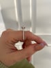 Platinum | 7.5mm Round Moissanite | Lab Diamond side stones