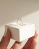 18k Yellow Gold / Platinum | 7mm Round Moissanite | Lab Diamond side stones