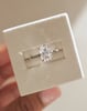 Platinum | 10x7mm Oval Moissanite
