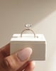 18k Rose Gold / Platinum | 11x8mm Oval Moissanite | Moissanite side stones