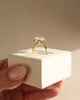 18k Yellow Gold | 10x7mm Oval Moissanite | Lab Diamond side stones