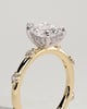 Amora - Pear Solitaire with Round Side Stones - 18k Yellow Gold / 18k White Gold