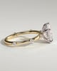 Amora - Pear Solitaire with Round Side Stones - 18k Yellow Gold / 18k White Gold