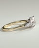 Arya - Round Trilogy with Pear Side Stones - 18k Yellow Gold / 18k White Gold