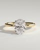 Aurelie - Oval 4 Claw Solitaire with Petal Gallery and Accent Leaf Detail Engagement Ring - 18k Yellow Gold / 18k White Gold