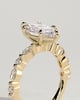 Beatrice - Marquise Claw Solitaire with Marquise and Round Accent Stones Engagement Ring - 18k Yellow Gold