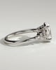 Bella - Oval 4 Claw Solitaire with Clustered Round Shoulder Stones Engagement Ring - 18k White Gold