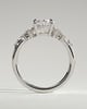 Bella - Oval Claw Solitaire with Clustered Round Shoulder Stones Engagement Ring - 18k White Gold