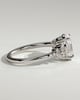 Bella - Oval Claw Solitaire with Clustered Round Shoulder Stones Engagement Ring - 18k White Gold