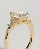 Bella - Oval Claw Solitaire with Clustered Round Shoulder Stones Engagement Ring - 18k Yellow Gold