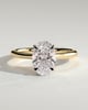 Bethany - Oval 4 Claw Solitaire with Hidden Halo, Tapered Band and Cathedral Setting Engagement Ring - 18k Yellow Gold / 18k White Gold
