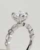 Cartia - Round Claw Solitaire with Round-Marquise Bezel Accent Stones Engagement Ring - 18k White Gold