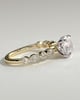 Cartia - Round Claw Solitaire with Round-Marquise Bezel Accent Stones Engagement Ring - 18k Yellow Gold / 18k White Gold