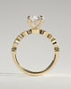 Cartia - Round Claw Solitaire with Round-Marquise Bezel Accent Stones Engagement Ring - 18k Yellow Gold