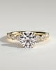 Cartia - Round Claw Solitaire with Round-Marquise Bezel Accent Stones Engagement Ring - 18k Yellow Gold