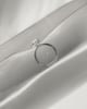 Cecilia - Oval Solitaire with Wrap Around Hidden Halo Lifestyle Image
