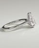Courtney - Pear Claw Solitaire with Hidden Halo, Tapered Band and Cathedral High Setting Engagement Ring - 18k White Gold
